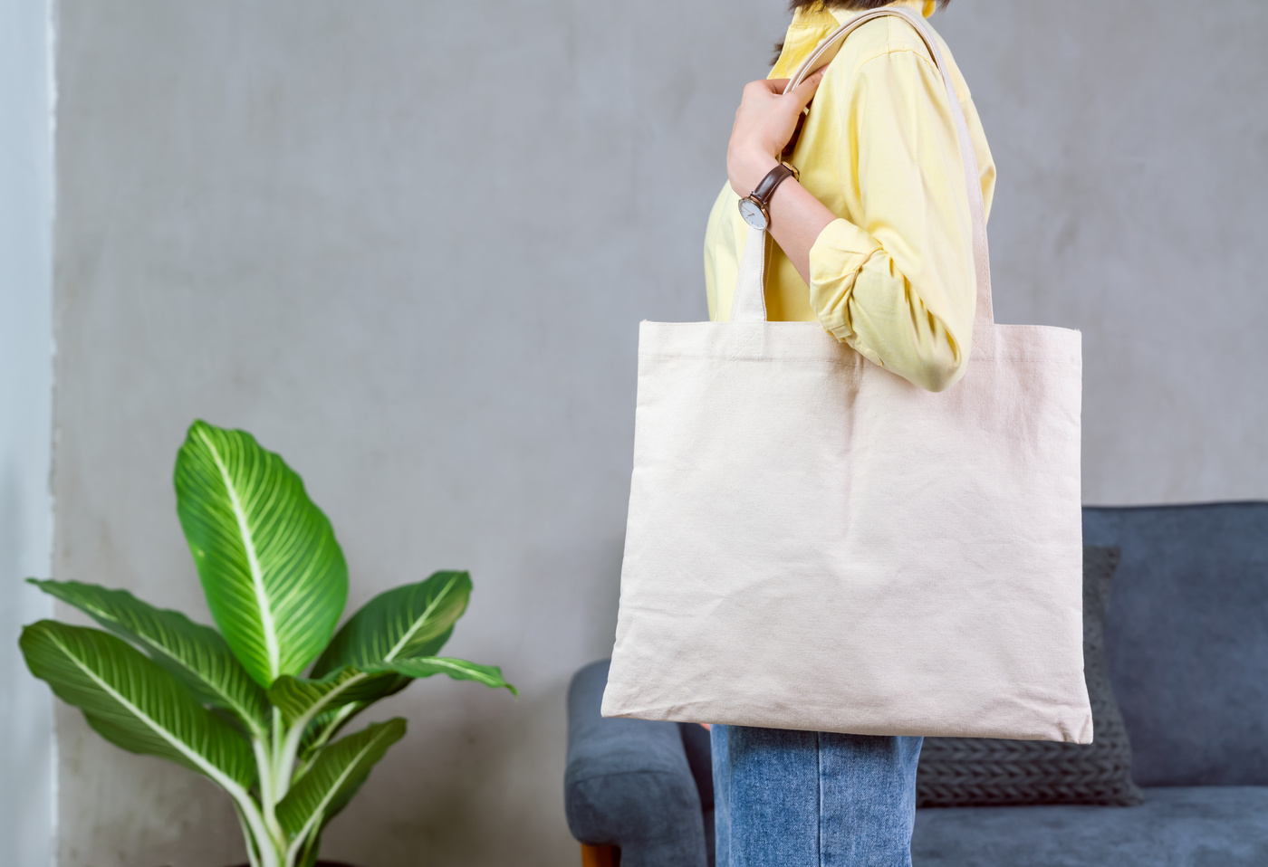 Person Toting a Canvas Bag  